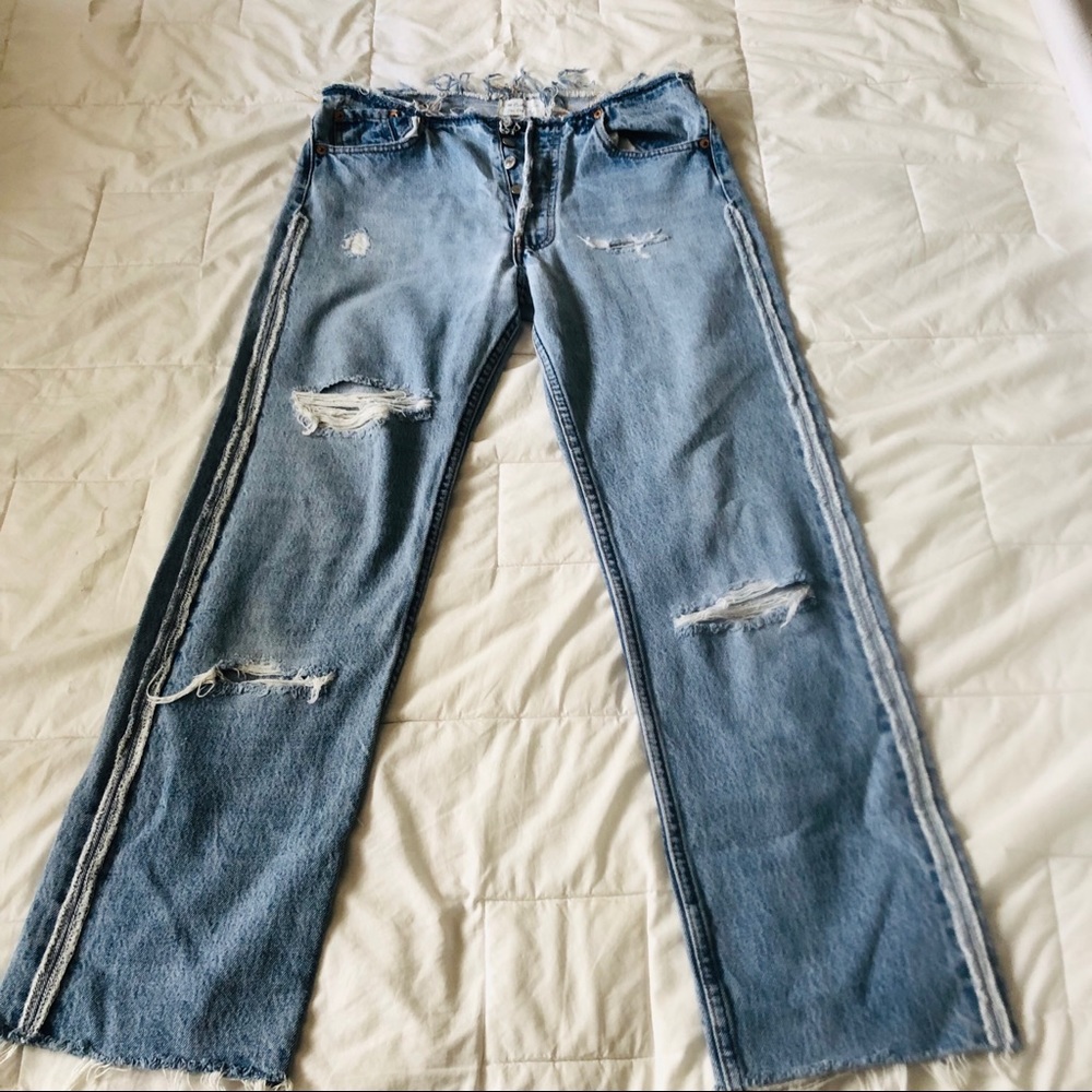 Altered & distressed Levi boyfriend jeans.